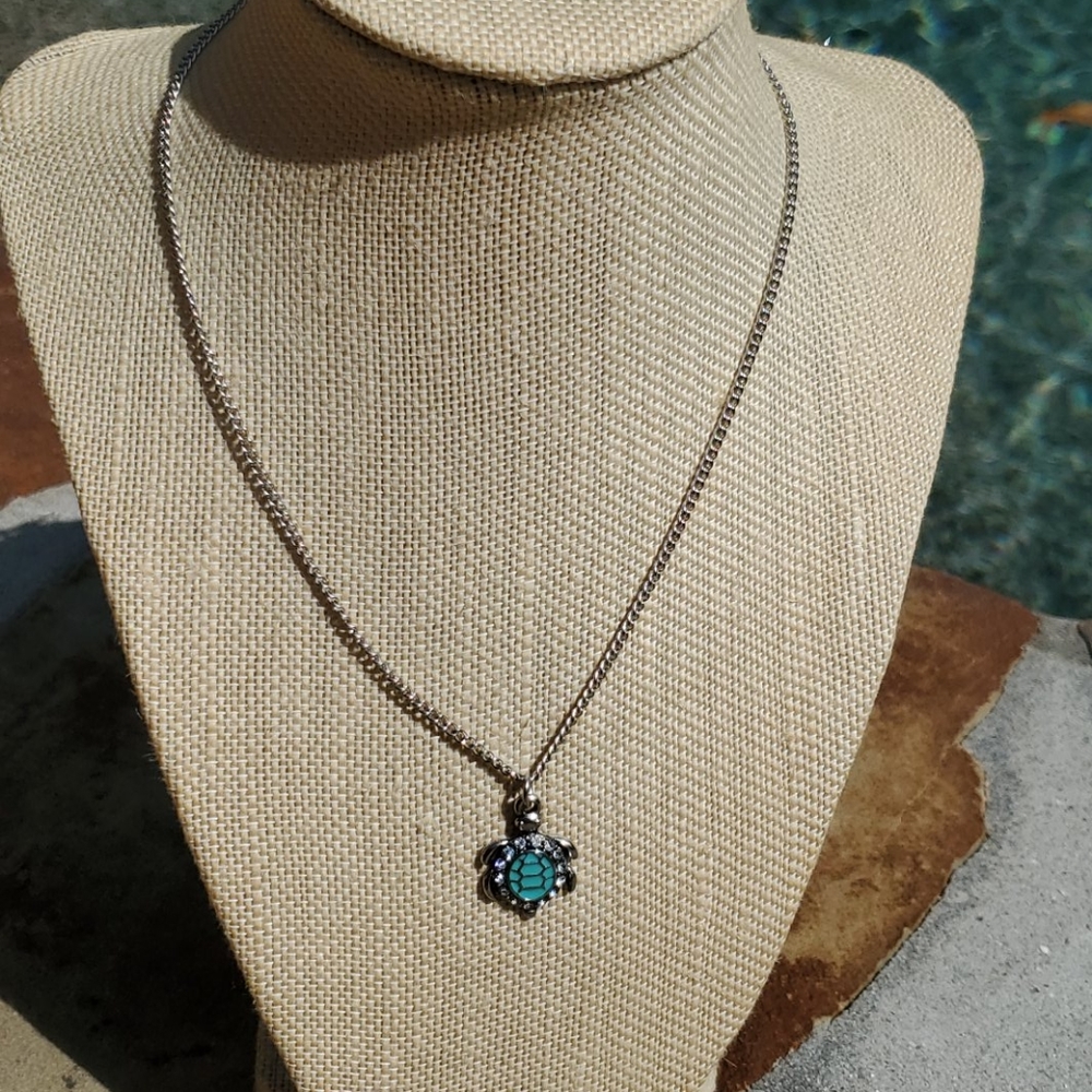 Silver plated necklace with Turtle charm.